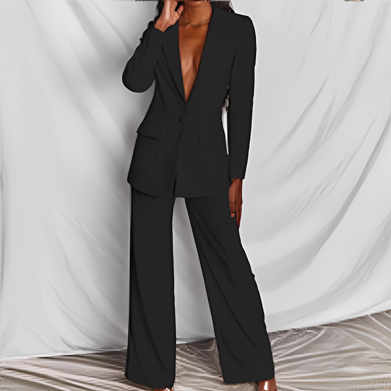 Women's FitiqueFit professional blazer and trousers suit set, featuring a long sleeve blazer and full-length trousers.