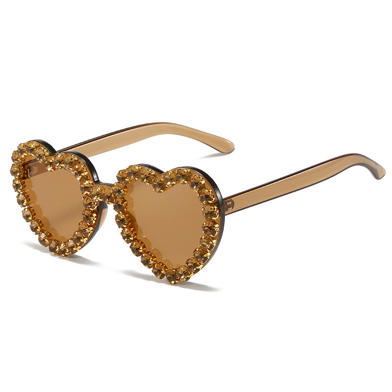 Peach heart-shaped rhinestone sunglasses from FitiqueFit with Y2K INS style, featuring vibrant peach color and decorative rhinestones.