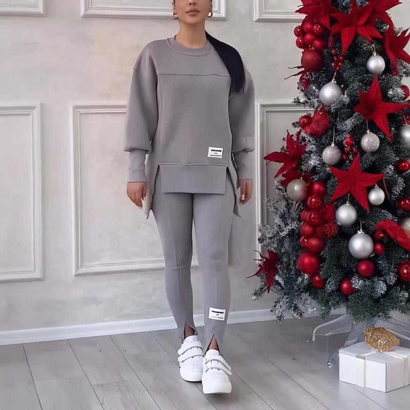 Women's solid color 2-piece casualwear set by FitiqueFit, featuring a comfortable top and matching pants in vibrant fabric.