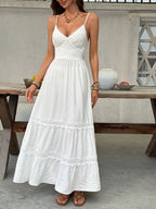 Women's V-neck tiered maxi dress with delicate lace details by Trendsi, flowing design, perfect for elegant summer occasions.