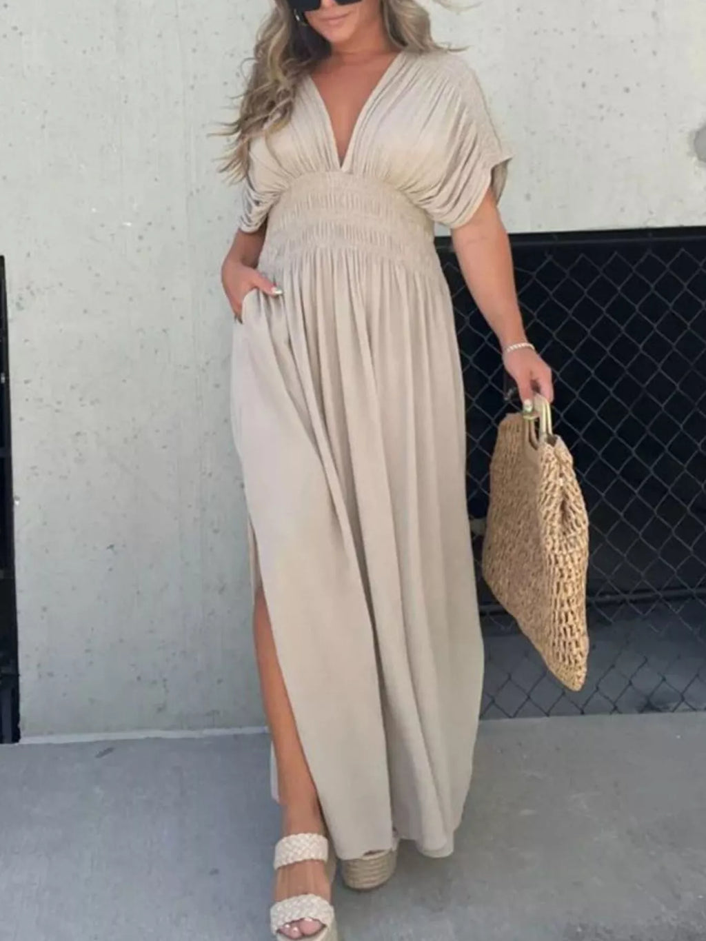 Plus size full length maxi dress with slit, V-neck, smocked waist by Trendsi, featuring flowy fabric and elegant design.