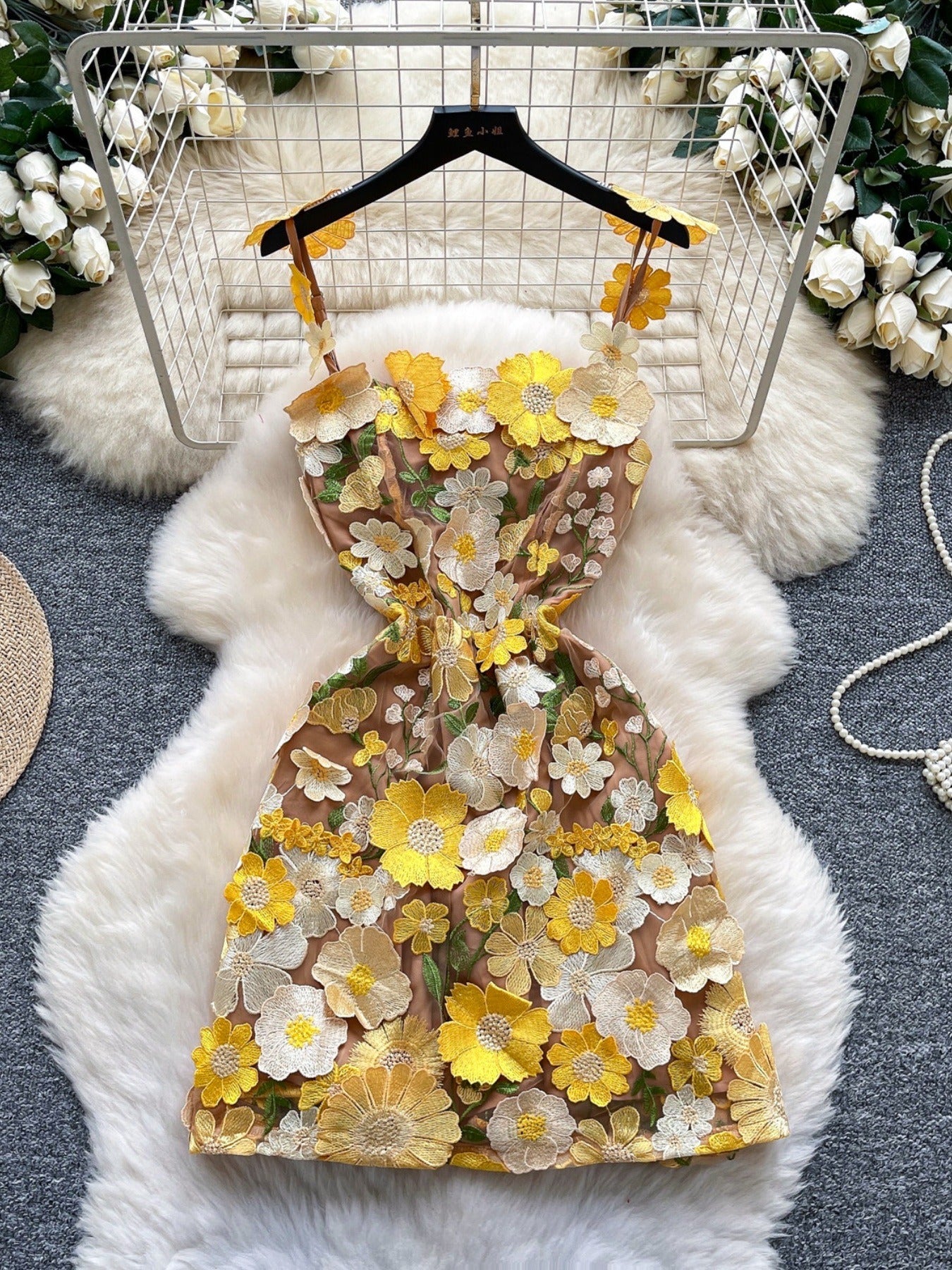 Floral embroidered tie waist mini dress by Trendsi, elegant summer A-line dress with colorful floral embroidery and a flattering fit.