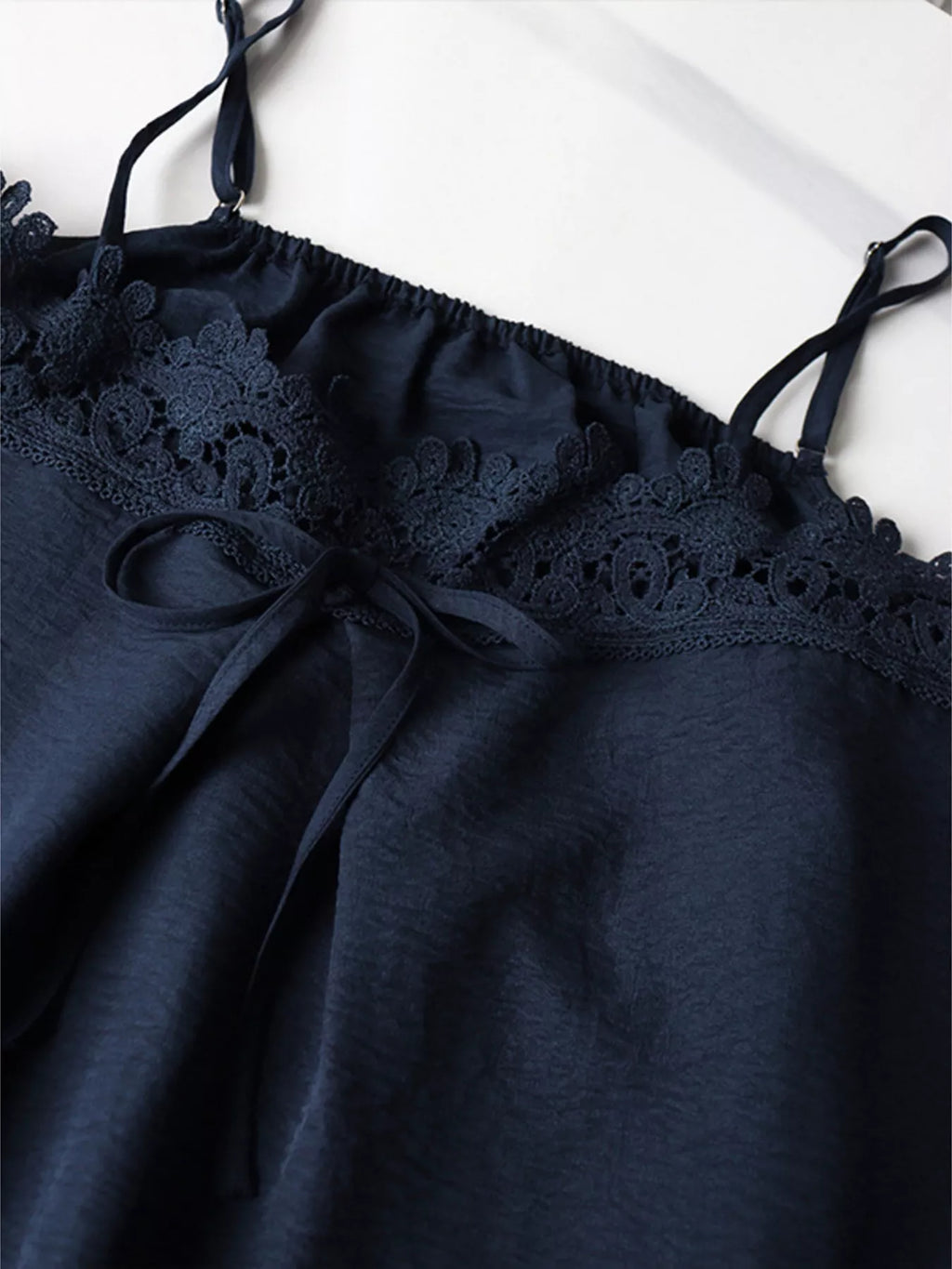 Lace trim cami and wide-leg pants set from Trendsi, featuring a delicate lace-trimmed top and flowy matching pants.