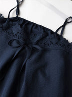 Lace trim cami and wide-leg pants set from Trendsi, featuring a delicate lace-trimmed top and flowy matching pants.
