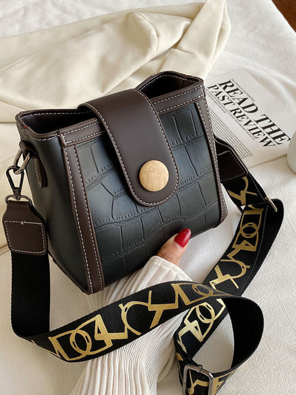 Crocodile embossed wide strap crossbody bag in premium PU leather with sleek design and durable hardware.