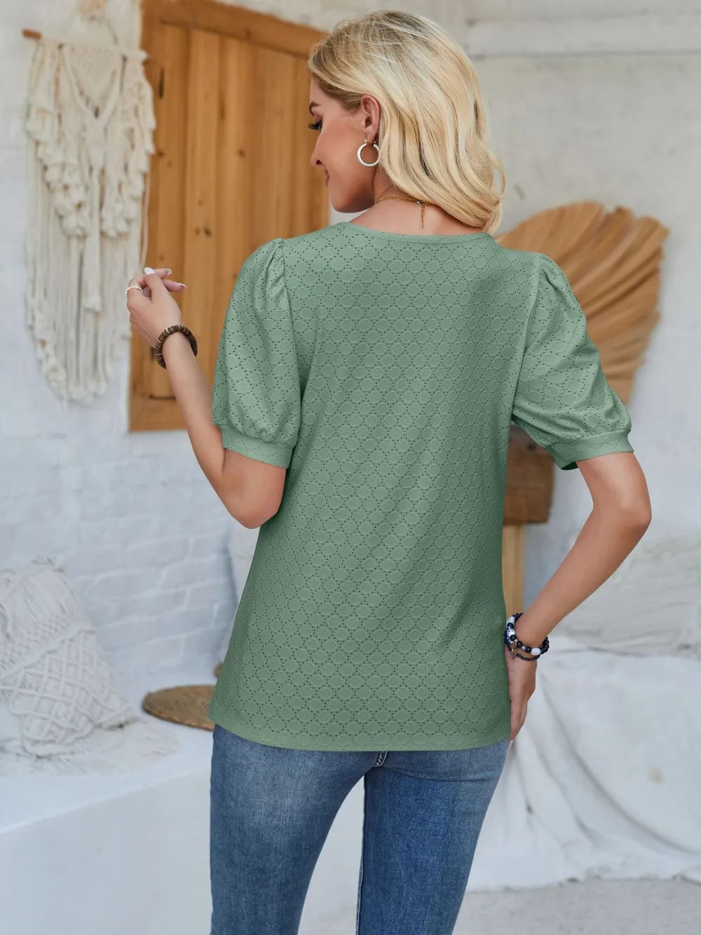 Light gray eyelet asymmetrical neck short sleeve T-shirt from Trendsi, featuring unique neckline and casual fit.