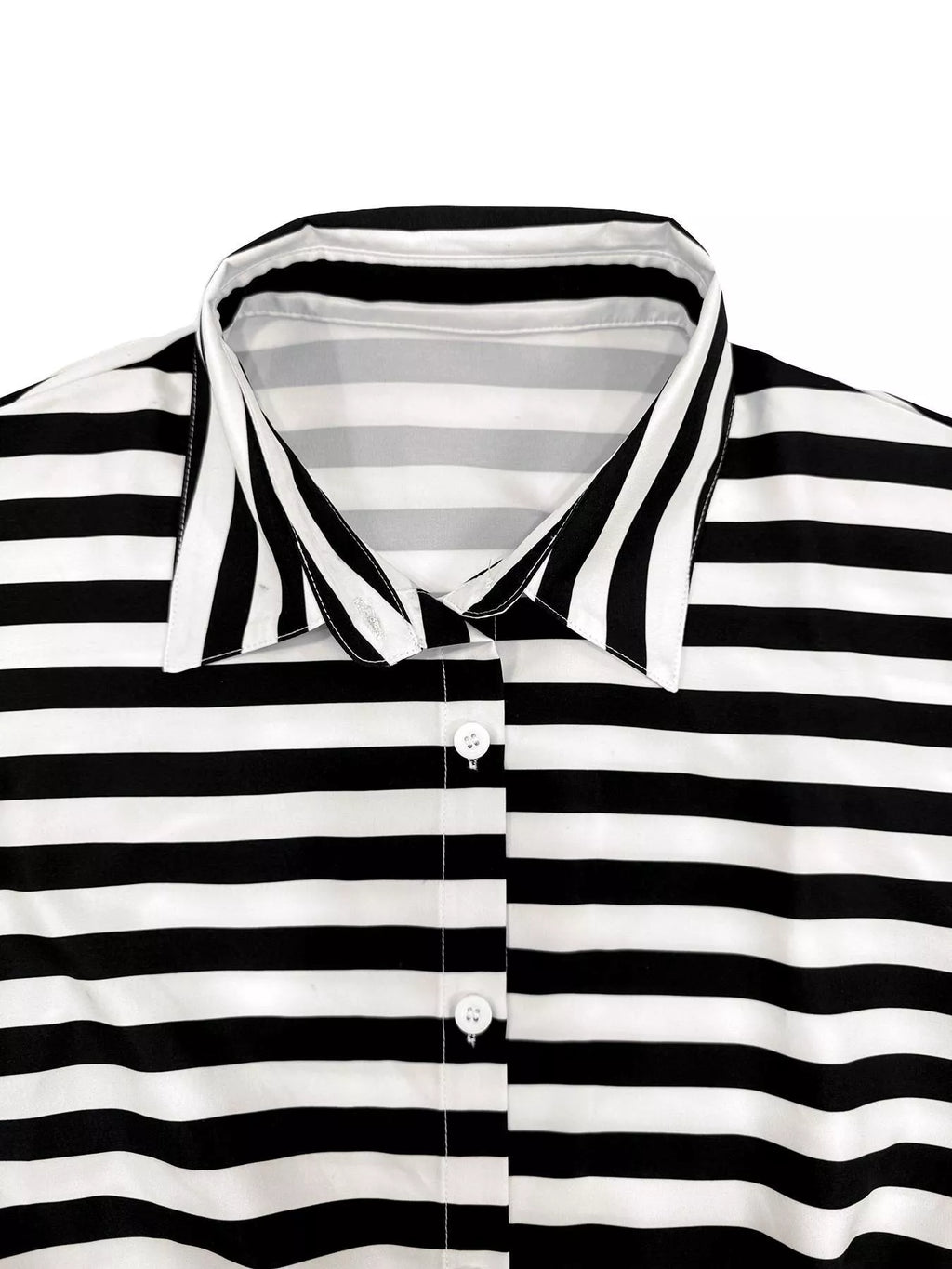 Striped button-up belted romper from Trendsi featuring short sleeves, a collar, and a waist belt for a stylish summer look.