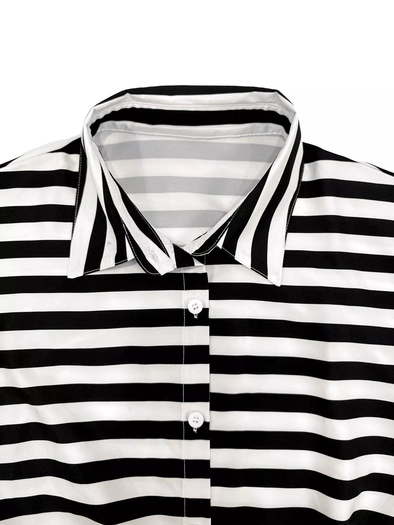 Striped button-up belted romper from Trendsi featuring short sleeves, a collar, and a waist belt for a stylish summer look.