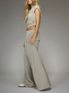 Striped crop top and wide-leg pants set by Trendsi, featuring a stylish coordinated dress with bold stripes and comfortable fit.