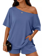 Plus size full size one shoulder top and shorts set by Trendsi, featuring a stylish casual summer outfit with a relaxed fit.