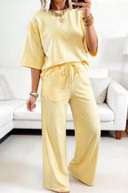 Trendsi half sleeve top and drawstring pants set in soft fabric, casual and comfortable outfit for everyday wear.