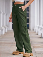 High-waisted cargo denim jeans by Plush Fashion Shop, featuring multiple pockets and a relaxed fit, displayed on a hanger.