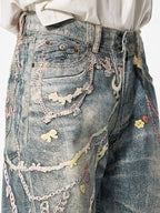 Men's wide leg denim jeans from Plush Fashion Shop, showcasing the relaxed fit and classic blue wash with visible stitching details.
