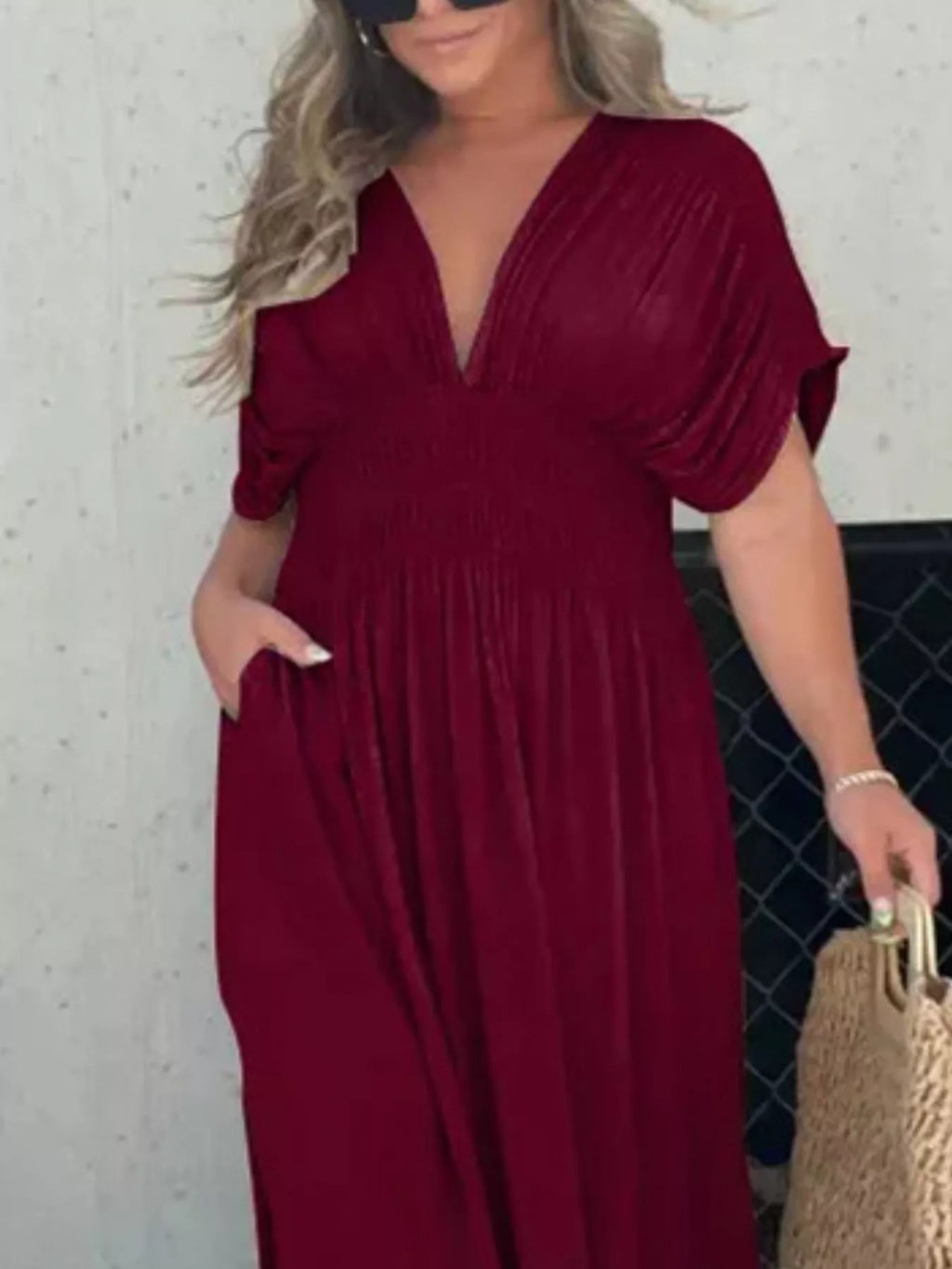 Plus size Trendsi full size slit V-neck maxi dress with smocked waist, flowing fabric, and elegant design.