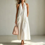 Cotton halterneck sleeveless dress by FitiqueFit featuring a deep V-neck and loose straight-line style for casual wear.