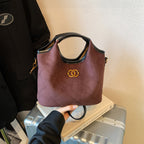Luxurious suede medium top handle handbag by Trendsi, featuring elegant shoulder strap and stylish design for everyday use.