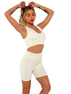 Seamless ribbed built-in bra tank top for women, longline workout crop top in activewear style by Plush Fashion Hub.