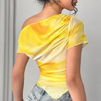 Yellow tie-dye mesh one-shoulder top with draped, ruched detailing and a handkerchief hem.