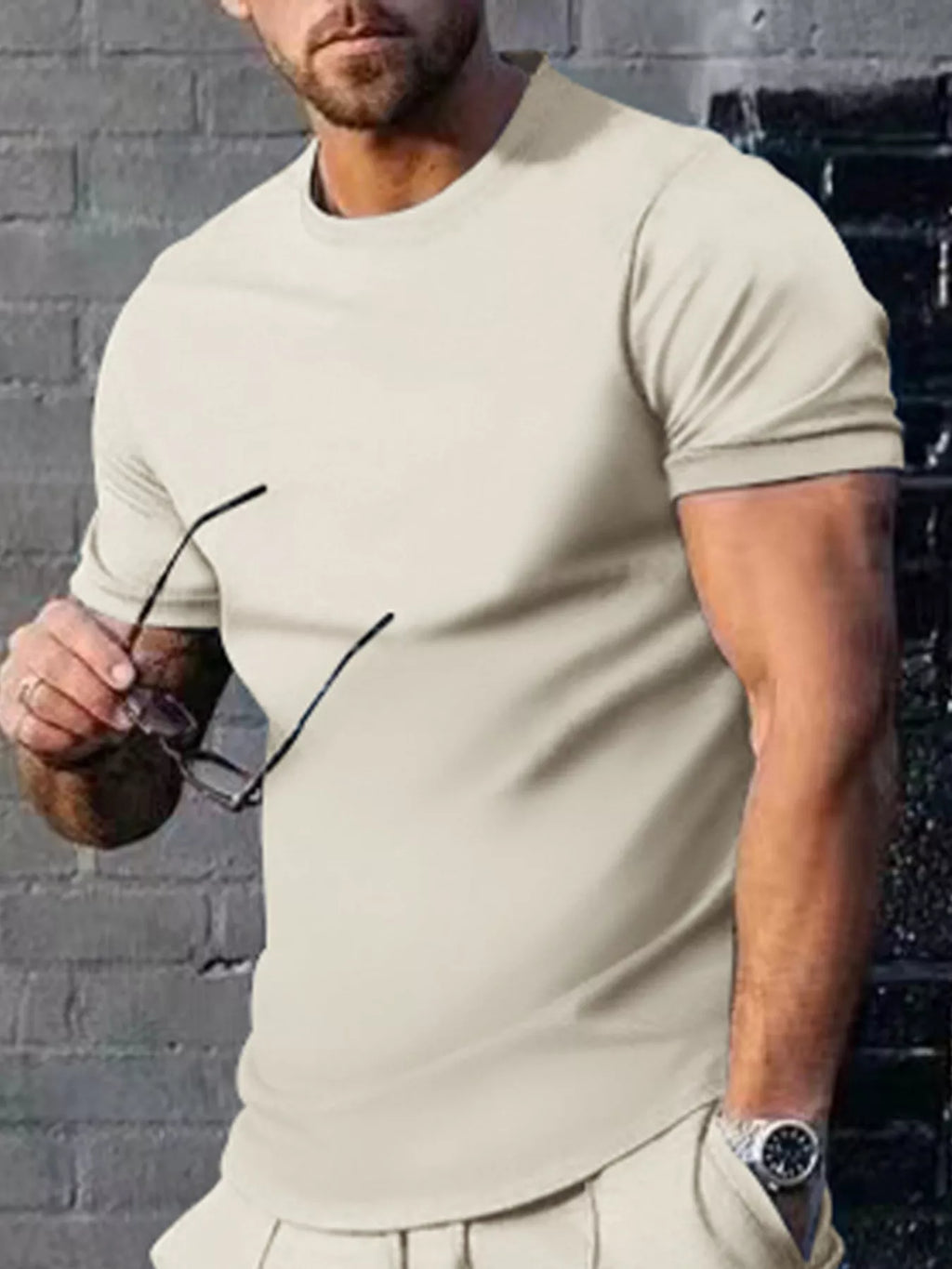 Men's plus size solid color casual T-shirt by Trendsi, front view showing round neckline and short sleeves.