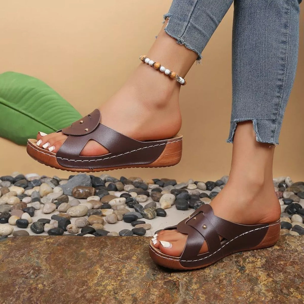 Open toe wedge sandals by Plush Fashion Hub featuring stylish straps and a comfortable cork wedge heel.