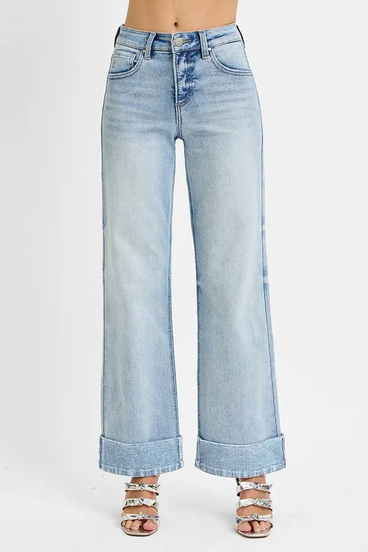 Stretchy denim high-rise ankle jeans with wide cuffs from Plush Fashion Hub, featuring tummy control and a fitted, stylish design.