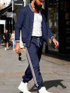 Men's plus size striped snap-down top and matching pants set from Trendsi, featuring a full-size, stylish coordinated outfit.