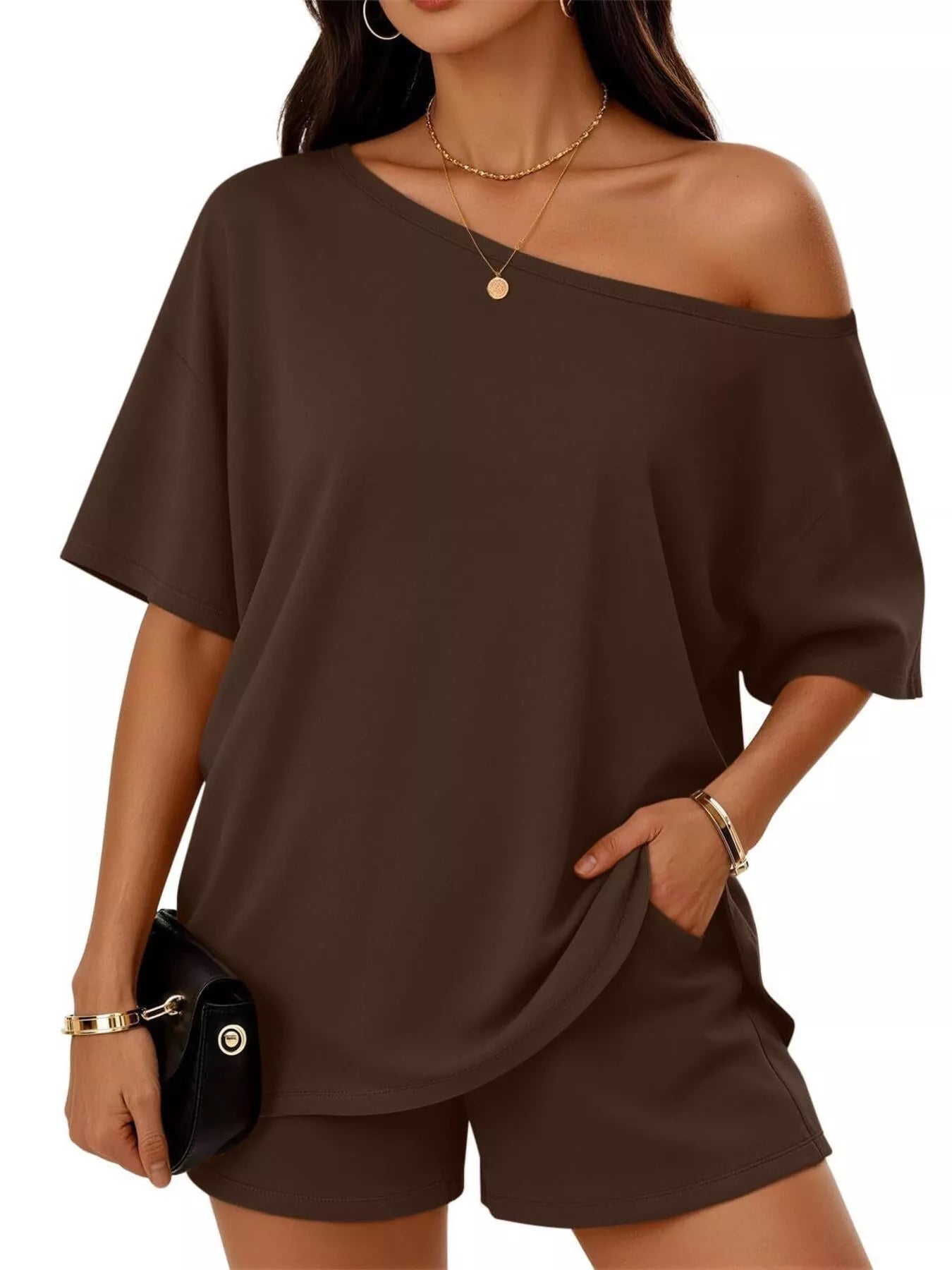 Plus size full size one-shoulder top and shorts set by Trendsi, featuring stylish design and comfortable fit.