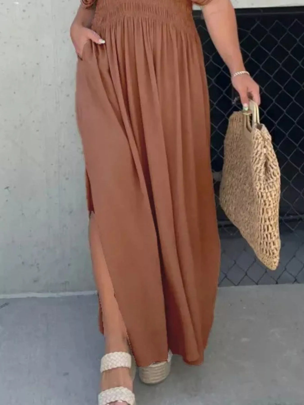 Plus size maxi dress with V-neck, slit front, smocked waist, trendy design by Trendsi, full-length, comfortable and stylish.