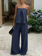 Lace trim cami and wide-leg pants set by Trendsi, featuring a delicate lace tank top and flowy wide-leg trousers.