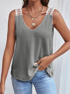 Women's waffle knit tank top with V-neck and lace trim, stylish and comfortable Trendsi sleeveless top for casual wear.
