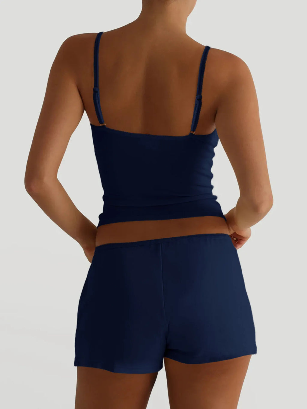 Trendsi V-neck cami and shorts active wear set in soft fabric, perfect for casual or workout wear, shown in a neutral color.