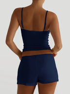 Trendsi V-neck cami and shorts active wear set in soft fabric, perfect for casual or workout wear, shown in a neutral color.