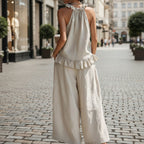 Casual FitiqueFit halterneck loose two-piece set with pleated asymmetric pocket design, perfect for stylish relaxed wear.