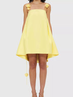 Floral strap mini A-line dress from Trendsi with a fitted bodice and flared skirt, featuring colorful floral patterns.