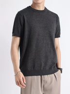 Men's plus size casual knitted short sleeve T-shirt by Trendsi, featuring a comfortable fit and soft fabric in a neutral color.