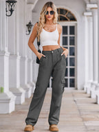 High-waisted cargo denim jeans from Plush Fashion Shop, featuring multiple pockets and a relaxed fit.