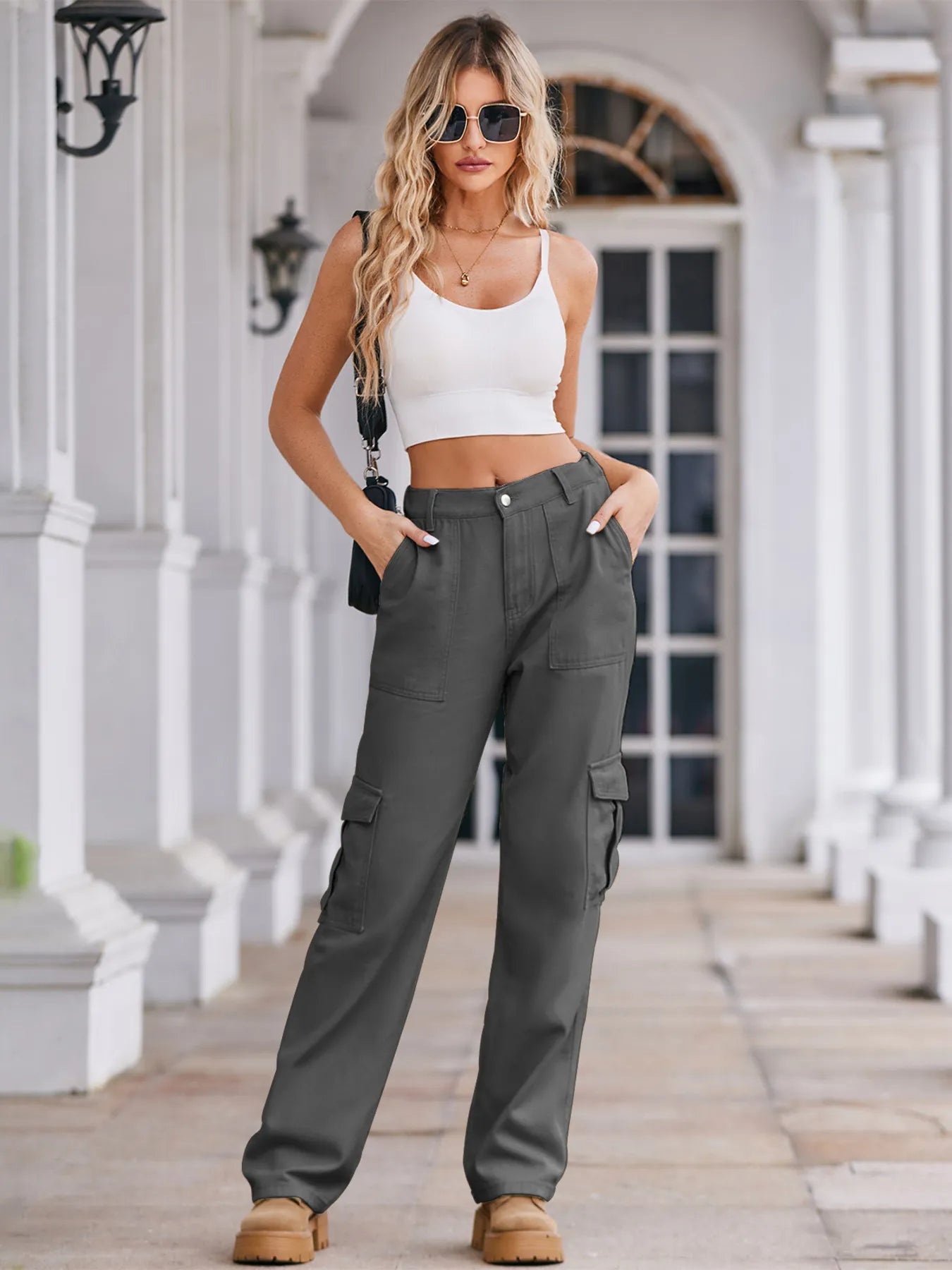 High-waisted cargo denim jeans from Plush Fashion Shop, featuring multiple pockets and a relaxed fit.