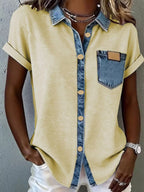 Denim trim short sleeve shirt by Trendsi, casual top with denim accents, displayed on a hanger against a white background.