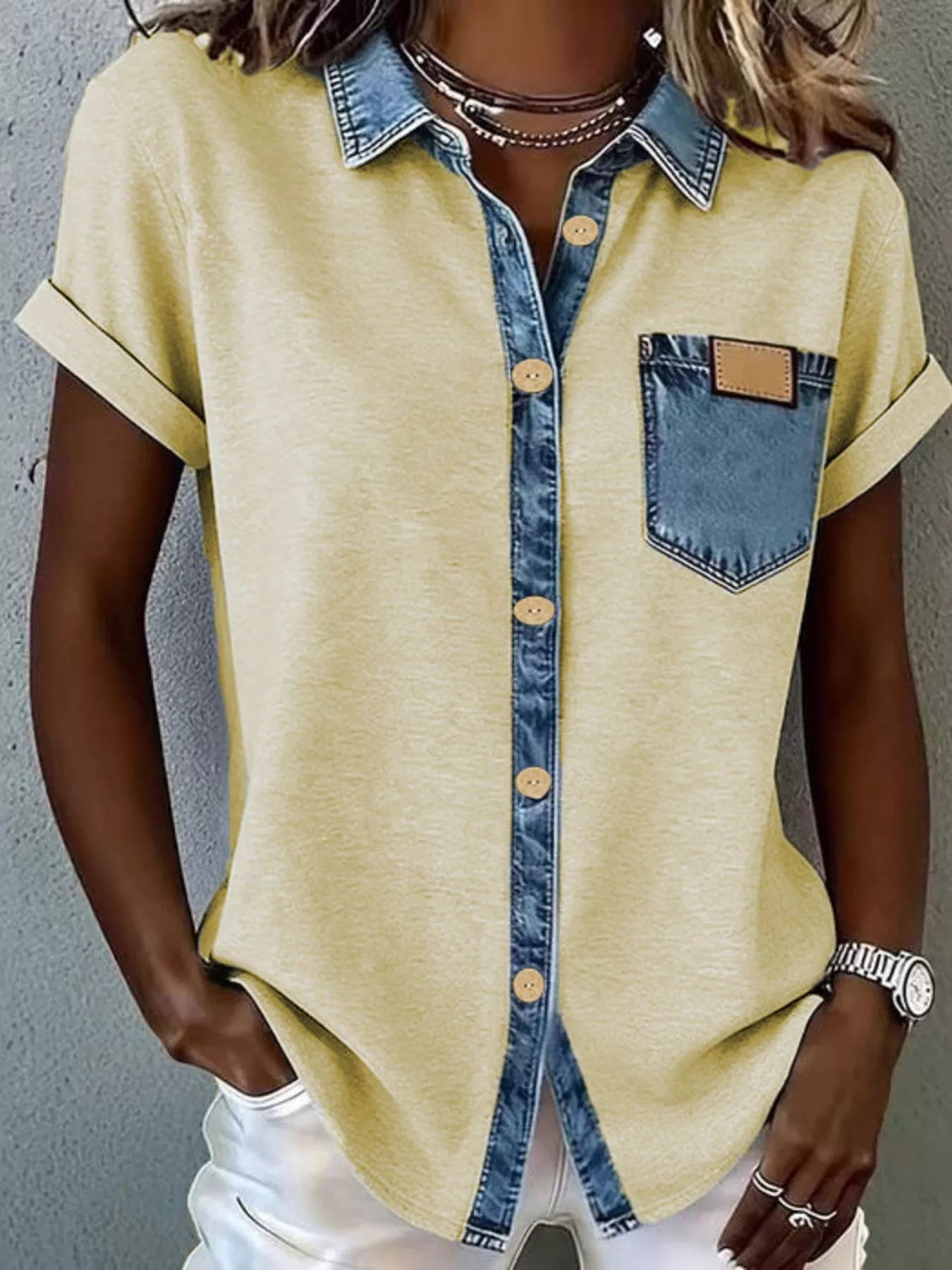 Denim trim short sleeve shirt by Trendsi, casual top with denim accents, displayed on a hanger against a white background.