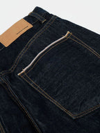 Men's wide leg denim jeans by Plush Fashion Shop, showing the relaxed fit and classic blue denim fabric.
