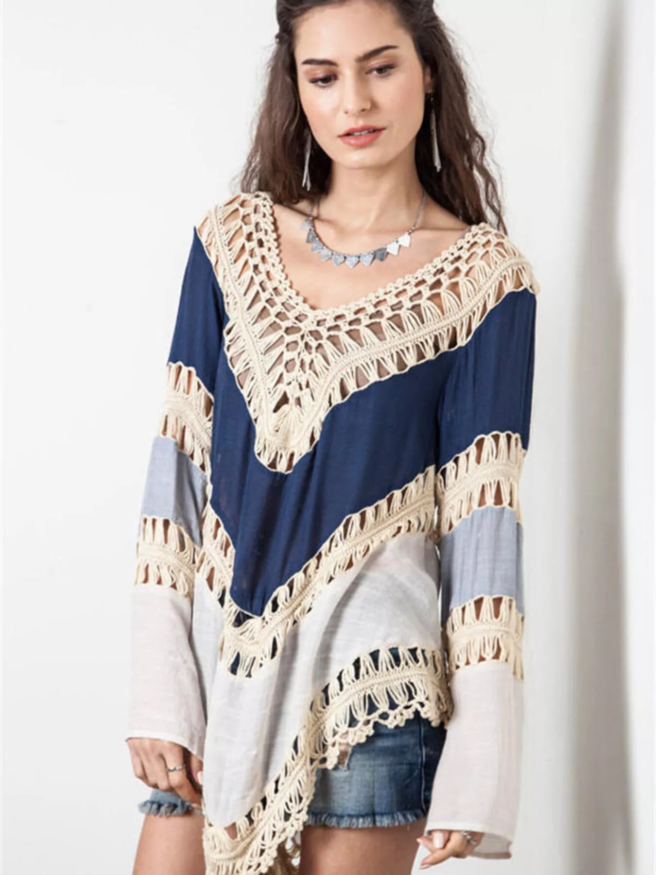 Crochet-trimmed long sleeve cover-up from Trendsi featuring lightweight fabric and intricate crochet detailing.