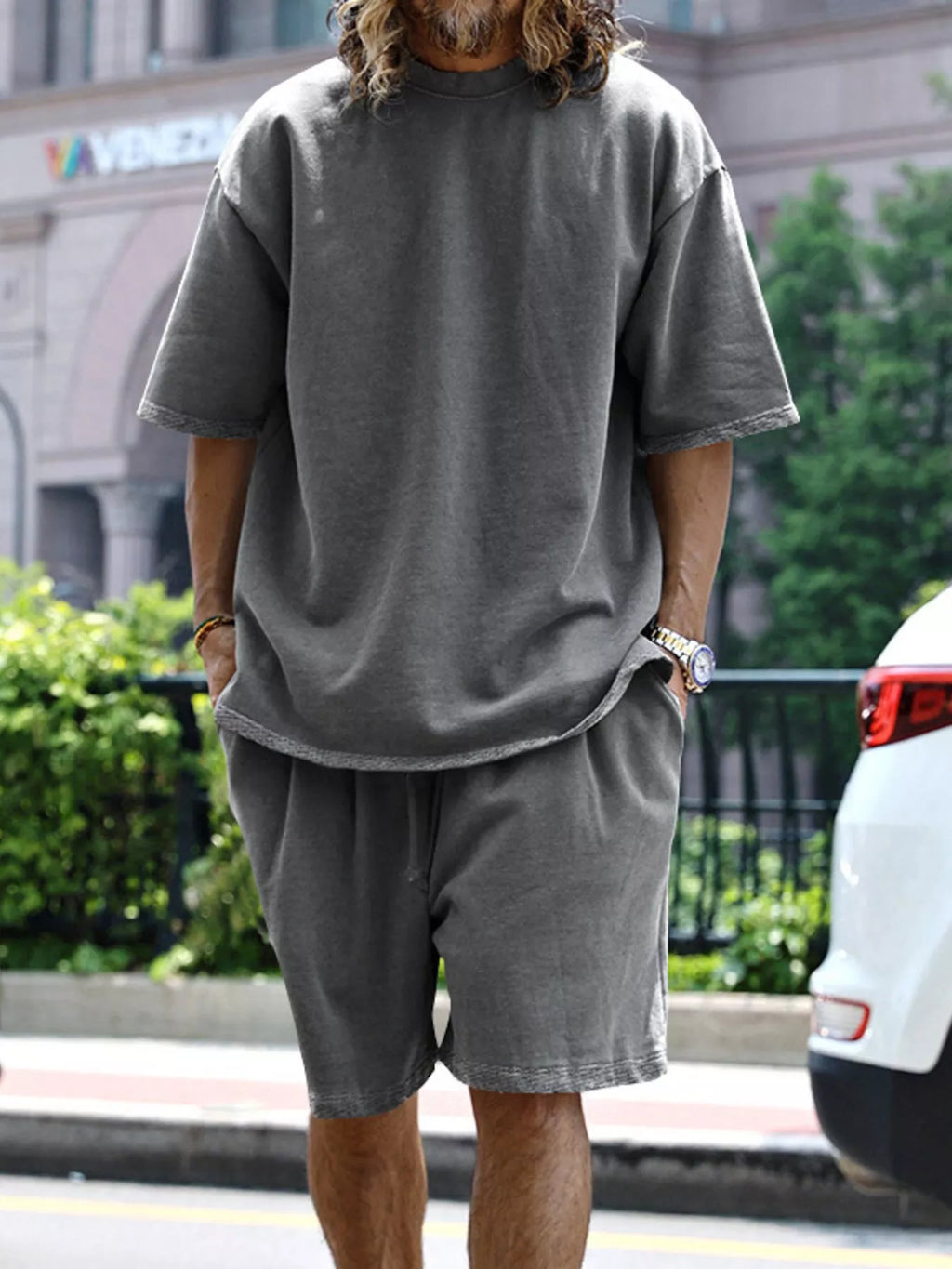 Men's relaxed fit T-shirt and shorts set in plus size from Trendsi, casual loungewear with a comfortable, relaxed style.