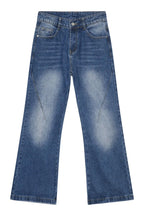 Light-washed denim jeans with front and back pockets from Plush Fashion Shop, showcasing a relaxed fit and classic style.