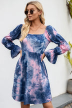 Ivy Lane tie-dye square neck dress with flounce sleeves, featuring a vibrant pattern and flowy silhouette for a casual, stylish look.