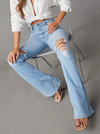 Distressed blue jeans with front and back pockets, trendy casual style, by Trendsi.