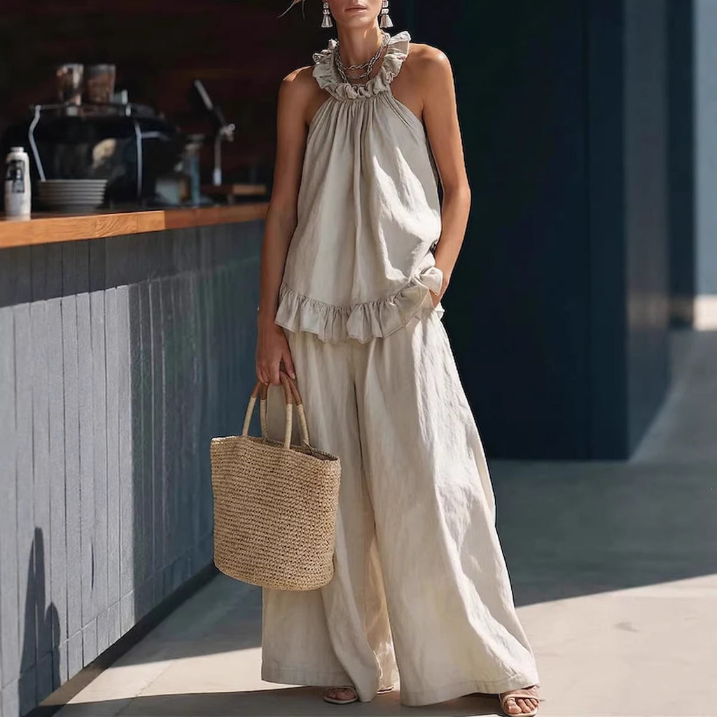 FitiqueFit halterneck loose two-piece casualwear set with pleated design and asymmetric pockets, perfect for relaxed, stylish outings.