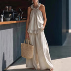 FitiqueFit halterneck loose two-piece casualwear set with pleated design and asymmetric pockets, perfect for relaxed, stylish outings.