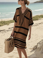 Plus size women's striped half-sleeve midi dress by Trendsi, casual chic everyday wear, featuring a stylish striped pattern and comfortable fit.