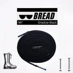 Black elastic shoelace by Bread, versatile and stretchable, shown in the shadow black color on a classic shoe.