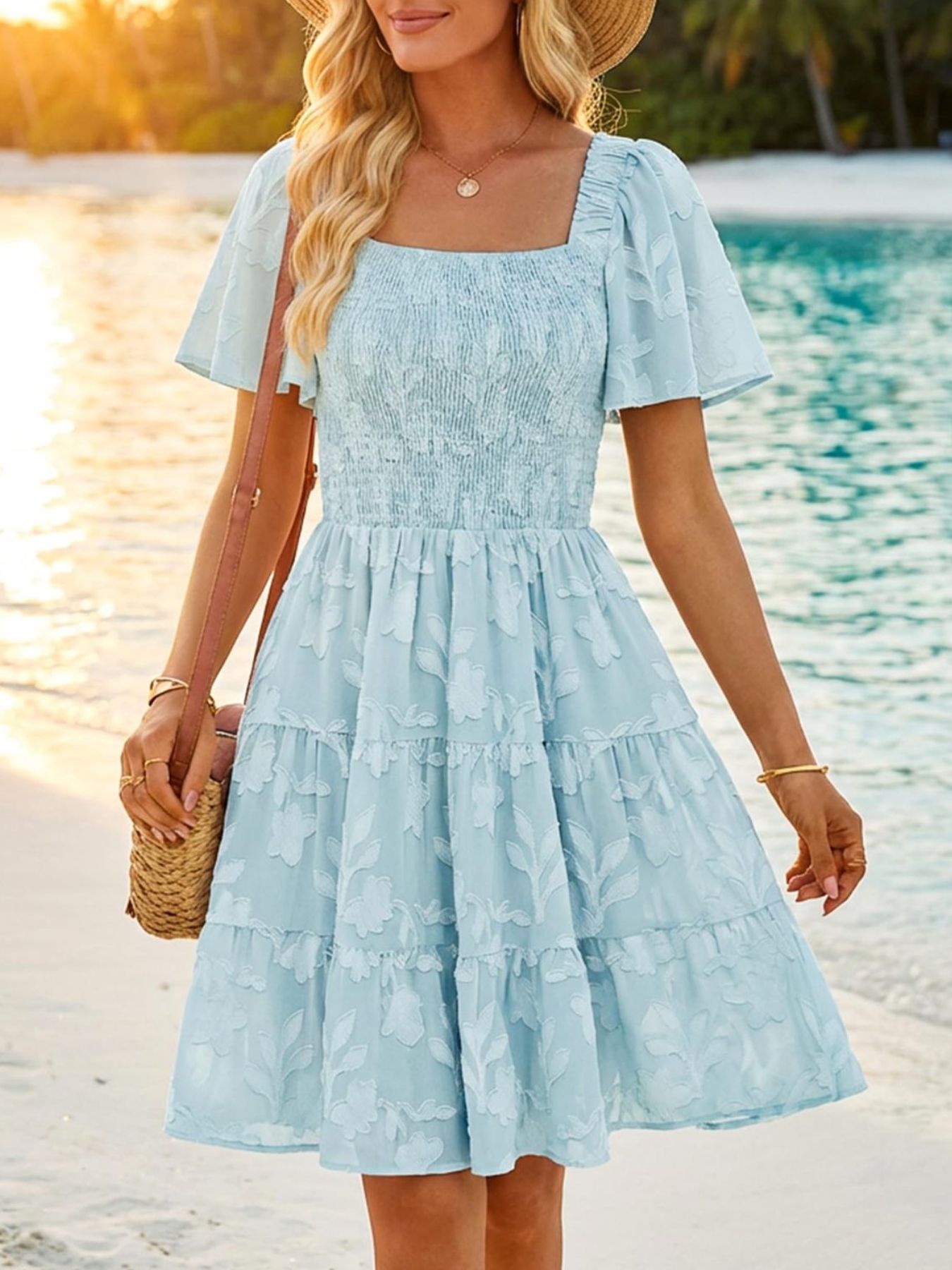 Women's smocked tiered square neck short sleeve casual dress with pockets by Trendsi, featuring a relaxed fit and stylish design.
